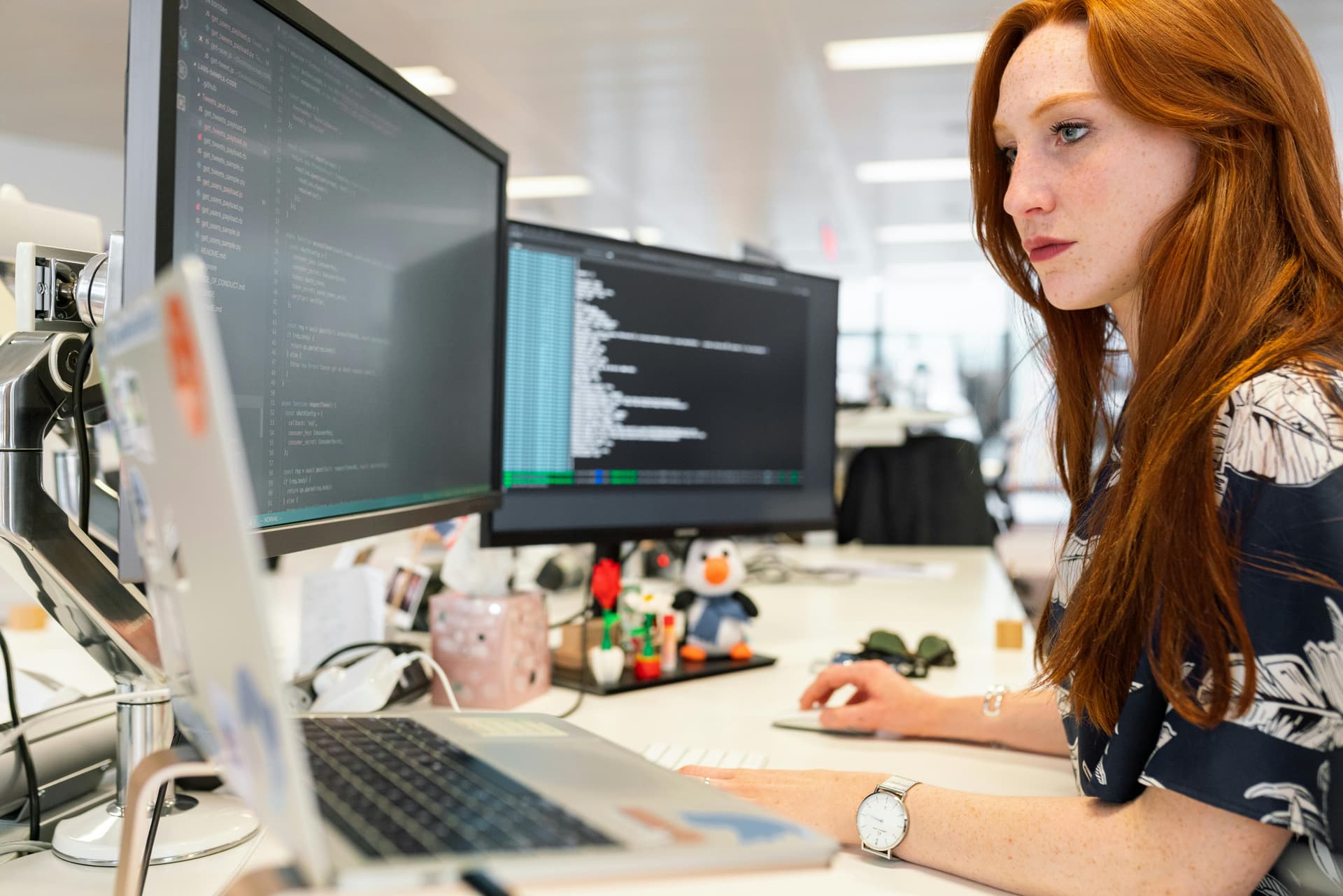 AI copilot for developers - software engineer using AI productivity tools for code generation and workflow automation in modern office environment