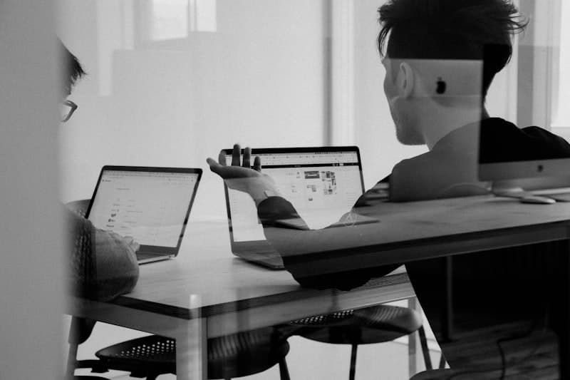 Business leaders discussing AI implementation - executive strategy meeting